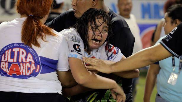 Stampede at football stadium leaves 12 dead and over 500 injured amid horrific crush
